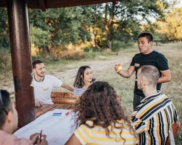 A professional at a company picnic, getting a group ready for Corporate Event Entertainment in Central Illinois